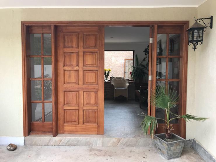 Không đặt gương trên cửa nhà mình đối diện với cửa nhà hàng xóm