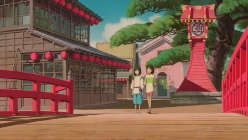Haku nắm tay Chihiro qua cầu.